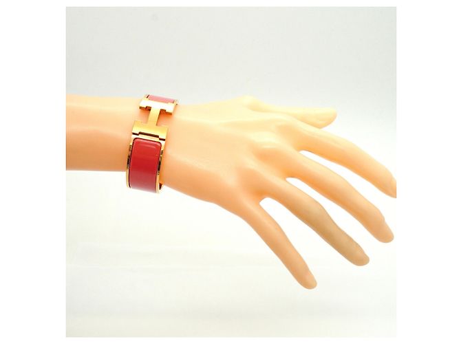 Bracciale Hermès Clic Clac GM in Oro e Rosso - vista 6