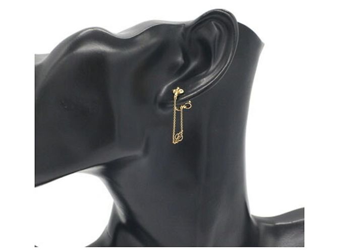 Pendientes de botón en metal dorado Louis Vuitton - vista 5