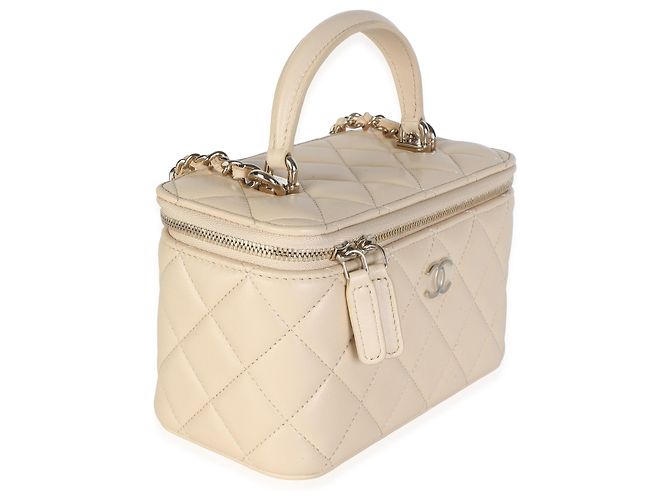 Piccola borsa vanity Chanel in pelle d'agnello matelassé beige con manico superiore e catena - vista 4
