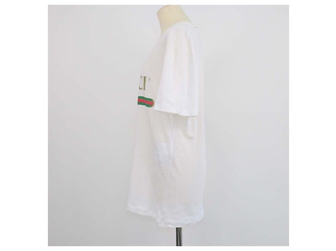 T-shirt Gucci in cotone bianco con logo stampato e effetto distressed - vista 2