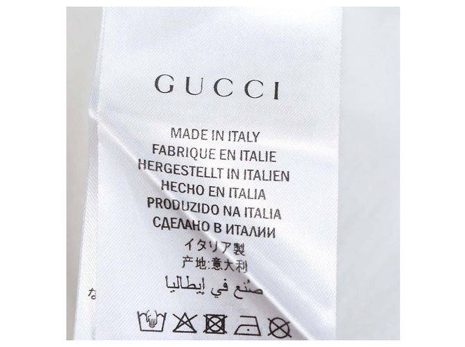 T-shirt Gucci in cotone bianco con logo stampato e effetto distressed - vista 6