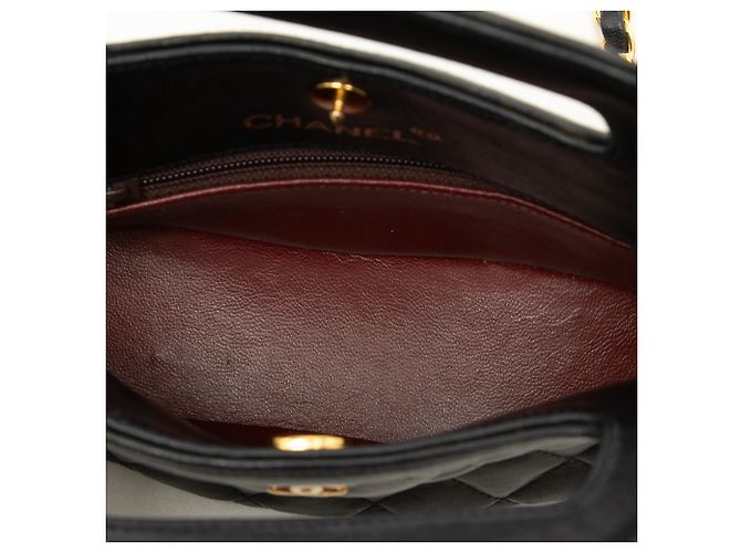 Borsa rotonda Chanel Black CC Quilted Lambskin con manico superiore - vista 4