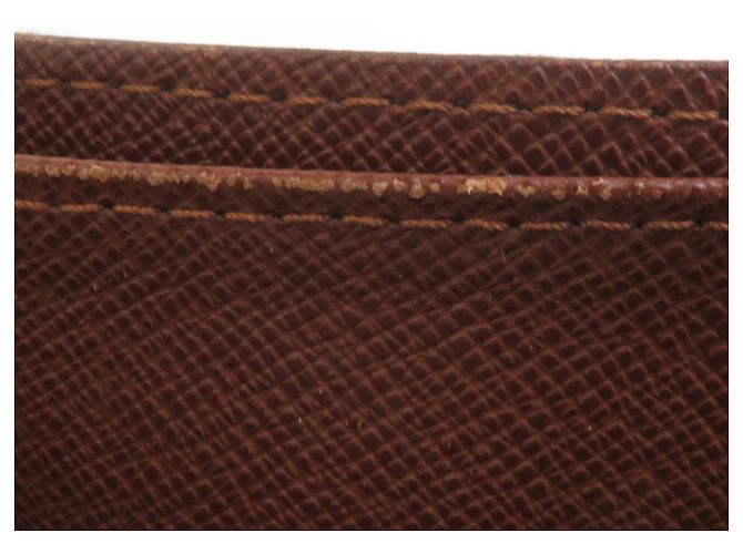 Cartera bi-fold Louis Vuitton en Monogram marrón - vista 6