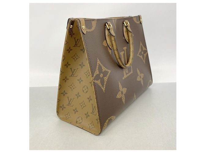 Bolso Tote Louis Vuitton Monogram Giant Reverse OnTheGo PM - vista 2
