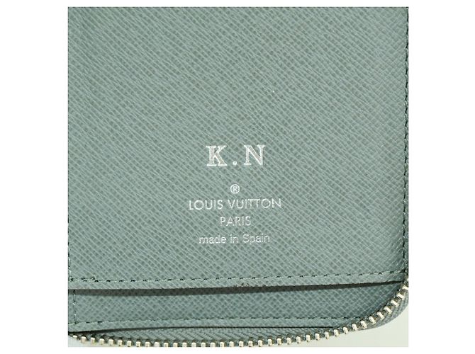 Louis Vuitton Taiga Zippy Wallet Vertical M32601 - vista 4