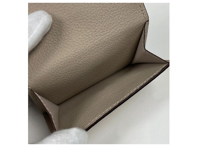 Louis Vuitton Portefeuille Lock Mini Tri-fold Wallet - vista 7