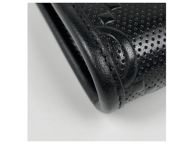 Borsa a tracolla mini in pelle goffrata GG di Gucci - vista 3