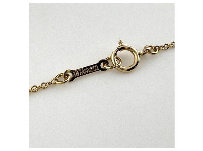 Autre Marque Collana con pendente Tiffany & Co. Kiss in oro giallo - vista 5