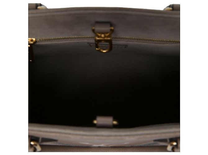 Louis Vuitton Brown Bicolor Monogram Empreinte Giant OnTheGo PM - Ansicht 4