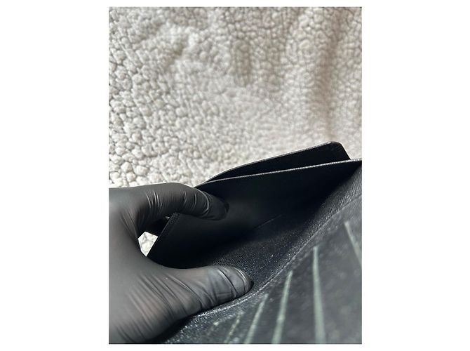 Louis Vuitton Brazza Wallet in Black Taiga Leather - view 11
