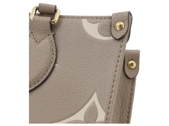 Borsa Tote Louis Vuitton Onthego PM Bicolor Monogram Empreinte - vista 9