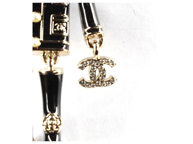 Chanel Spilla Coco Lion in metallo dorato e smalto nero - vista 4