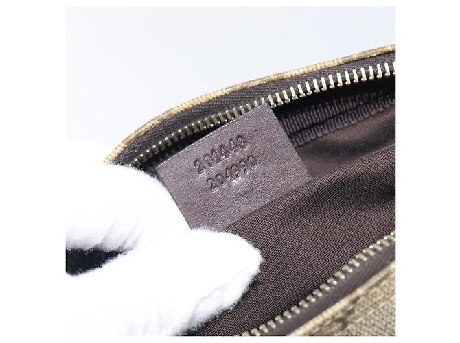 Sac Messenger Gucci avec fermeture éclair frontale en toile enduite GG Medium - vue 7