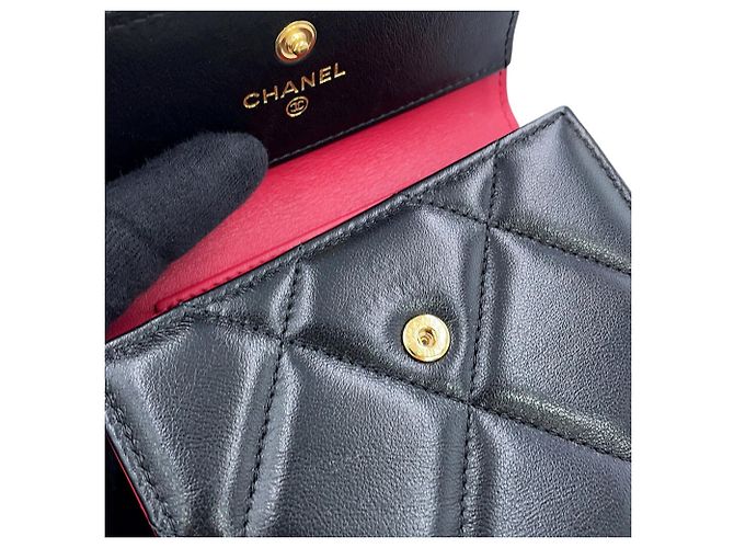 Cartera Chanel negra tri-fold en lambskin - vista 7