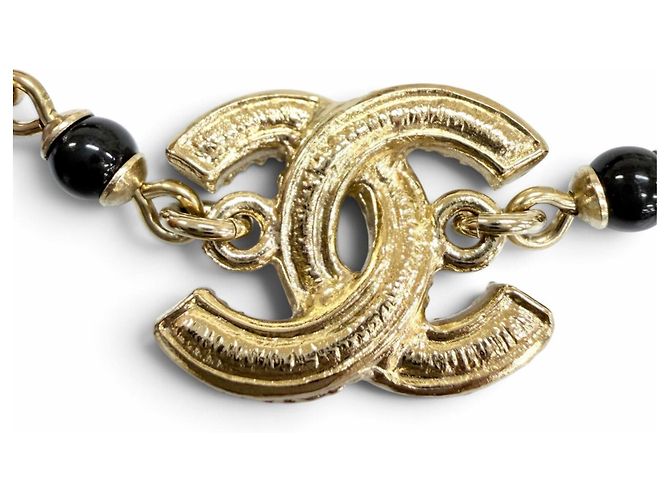 Bracciale Chanel con ciondolo perla eco e logo Coco in metallo dorato - vista 4