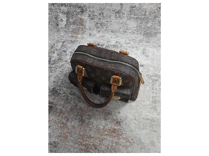 Magnifica Borsa Louis Vuitton Manhattan - vista 6