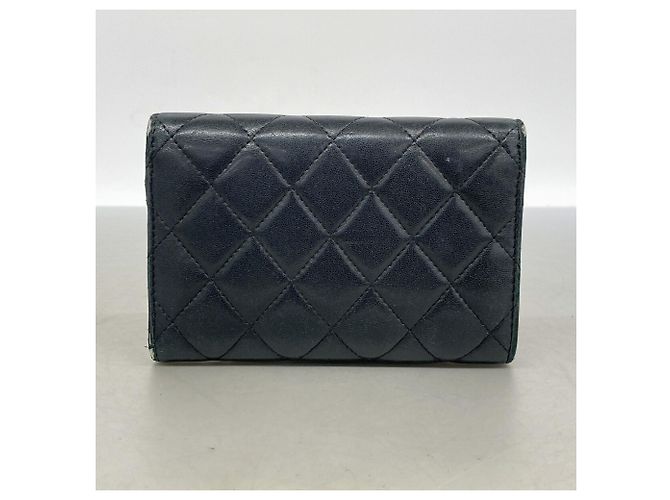 Cartera tri-fold Chanel de piel de cordero negra - vista 9