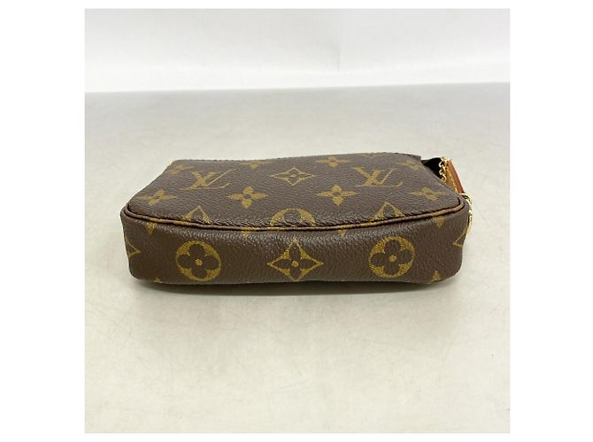 Louis Vuitton Monogram Mini Pochette Accessoires - vista 3