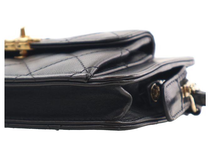 Clutch Chanel in pelle di agnello matelassé nera con tasca frontale e catena - vista 10