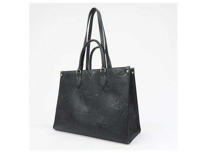 Louis Vuitton OnTheGo Monogram Empreinte Giant MM - vista 3