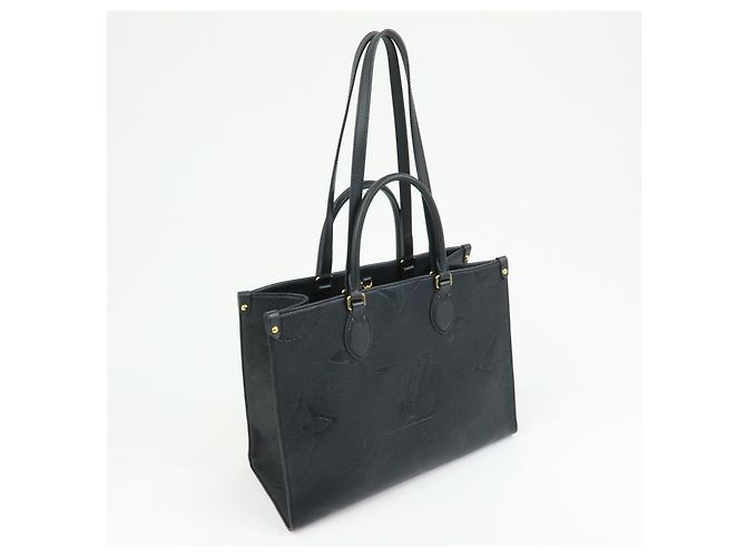 Louis Vuitton OnTheGo Monogram Empreinte Giant MM - vista 4