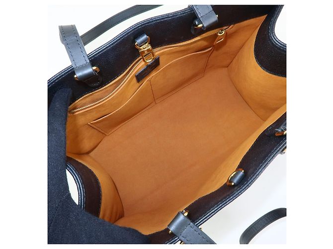 Louis Vuitton OnTheGo Monogram Empreinte Giant MM - vista 5