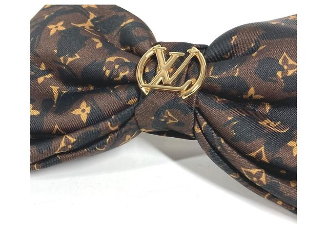 Fermi capelli Louis Vuitton con stampa leopardata - vista 2