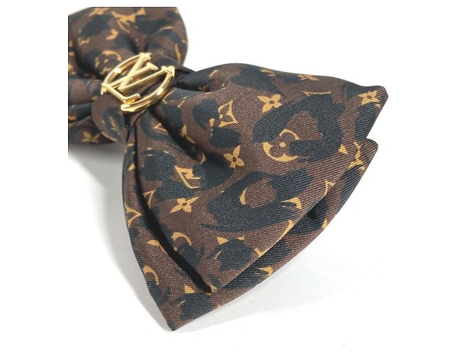 Fermi capelli Louis Vuitton con stampa leopardata - vista 3
