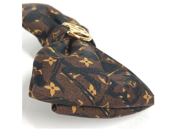 Fermi capelli Louis Vuitton con stampa leopardata - vista 5