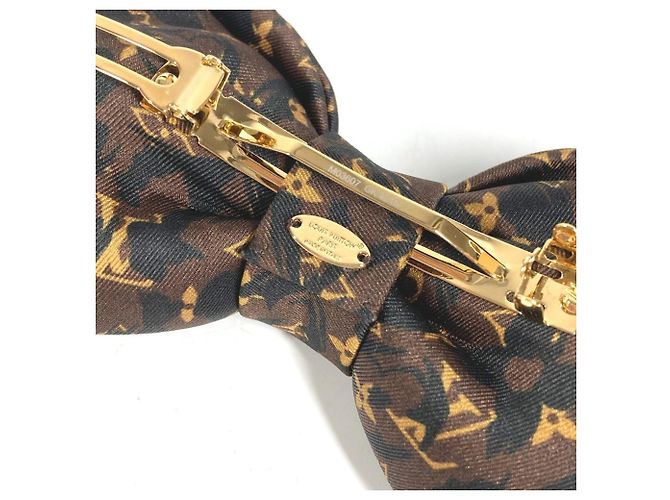 Fermi capelli Louis Vuitton con stampa leopardata - vista 7