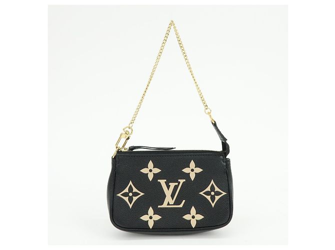 Louis Vuitton Pochette Accessoires Bicolor Monogram Empreinte Giant Mini - vista 2