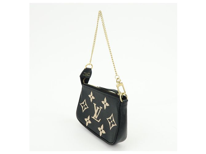 Louis Vuitton Pochette Accessoires Bicolor Monogram Empreinte Giant Mini - vista 3
