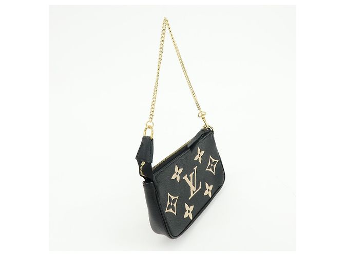 Louis Vuitton Pochette Accessoires Bicolor Monogram Empreinte Giant Mini - vista 4