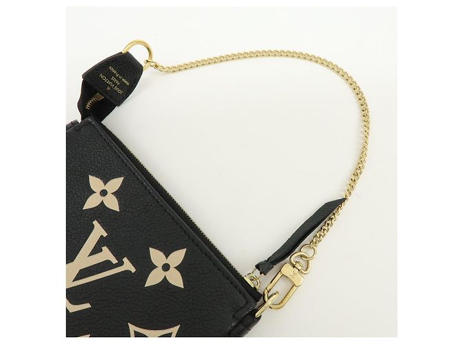 Louis Vuitton Pochette Accessoires Bicolor Monogram Empreinte Giant Mini - vista 7