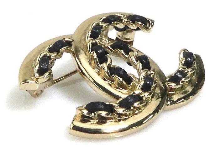 Spilla in pelle nera e oro Chanel - vista 2