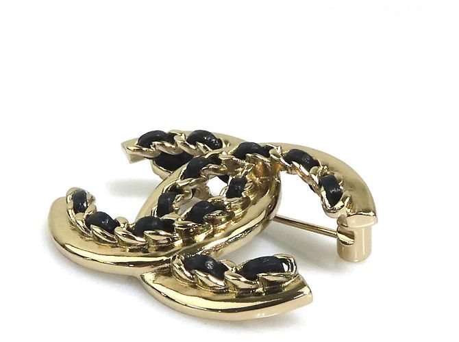 Spilla in pelle nera e oro Chanel - vista 3