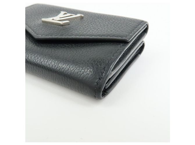 Louis Vuitton Lockmini Leather - vista 7