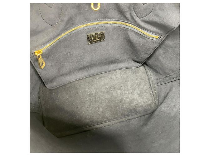 Sac cabas Louis Vuitton Neverfull MM Monogram Empreinte - vue 4
