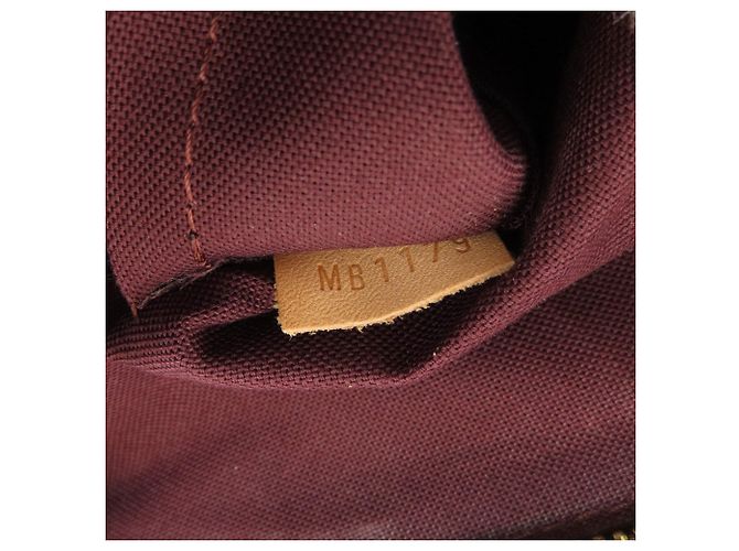 Louis Vuitton M44546 Rivoli MM Handbag - vista 7