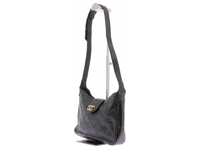 Chanel Borsa in pelle nera con logo dorato - vista 2