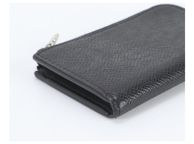 Portamonete Louis Vuitton Taiga - vista 4