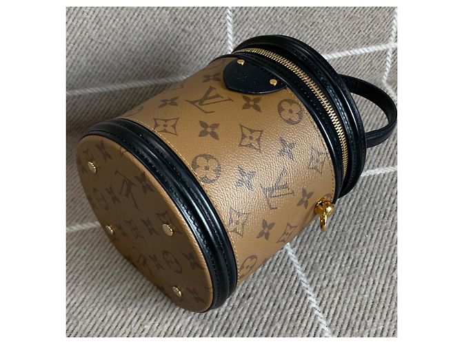 Louis Vuitton Money Bucket - vista 6