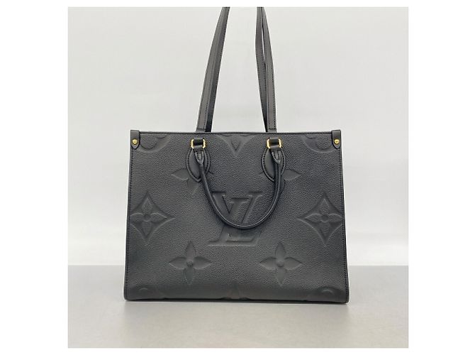 Borsa Tote Louis Vuitton Monogram Empreinte OnTheGo MM - vista 14