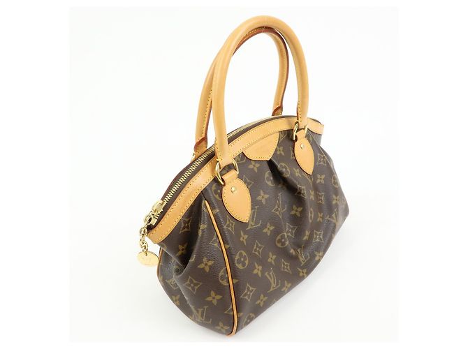 Louis Vuitton Tivoli Monogram Canvas PM - vista 4
