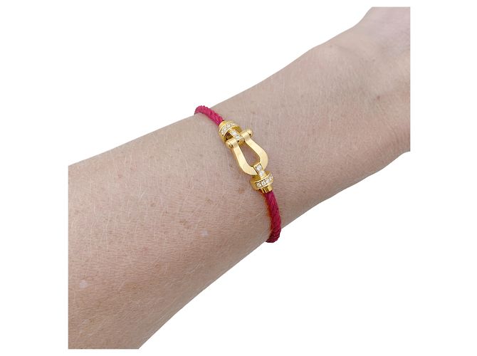 Bracciale Fred, "Force 10, modello medio, semi-pavé", in oro giallo e diamanti. - vista 4