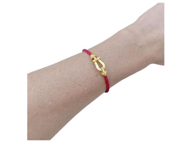 Bracciale Fred, "Force 10, modello medio, semi-pavé", in oro giallo e diamanti. - vista 5
