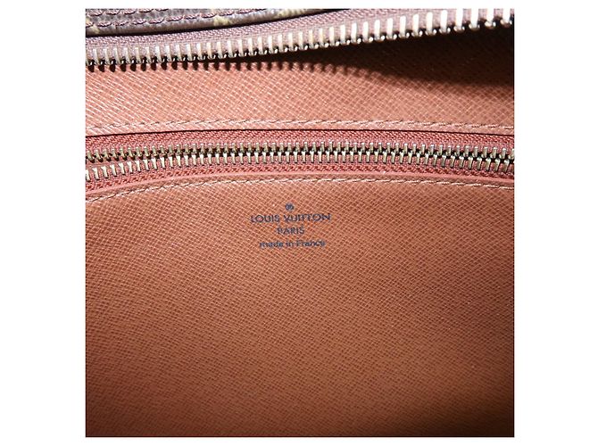 Louis Vuitton Trocadero Monogram Canvas 27 - vista 6