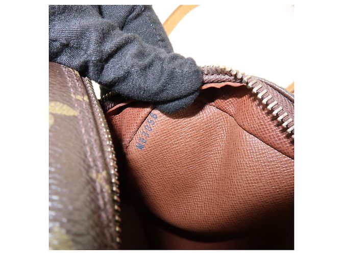 Louis Vuitton Trocadero Monogram Canvas 27 - vista 7