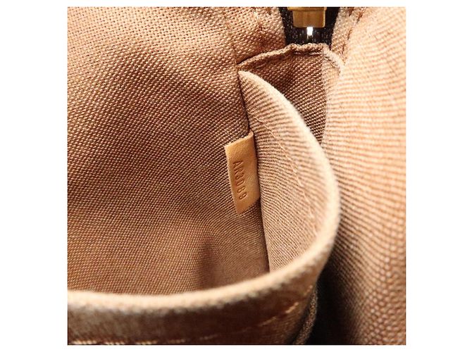 Louis Vuitton Trotteur Beaubourg Monogram Canvas - vista 7