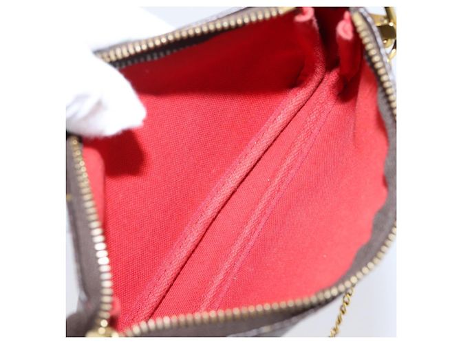 LOUIS VUITTON Monogram Vivienne Mini Pochette Accessoires M69976 - vista 10